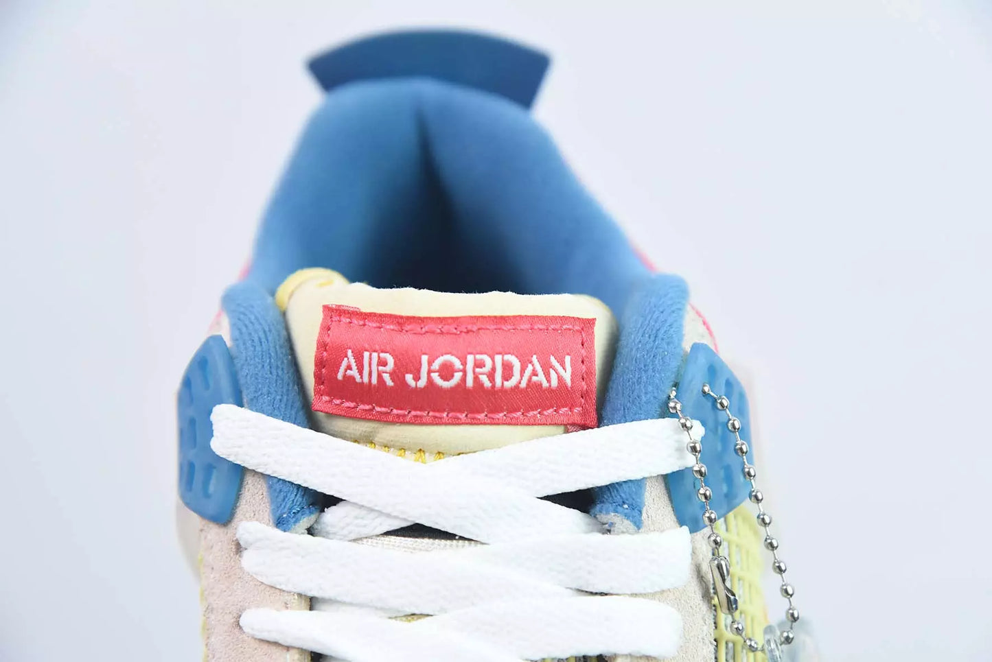 Jordan 4 Retro Union Guava Ice