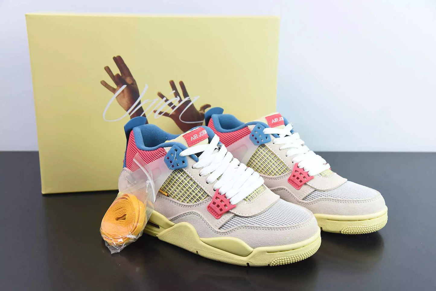 Jordan 4 Retro Union Guava Ice
