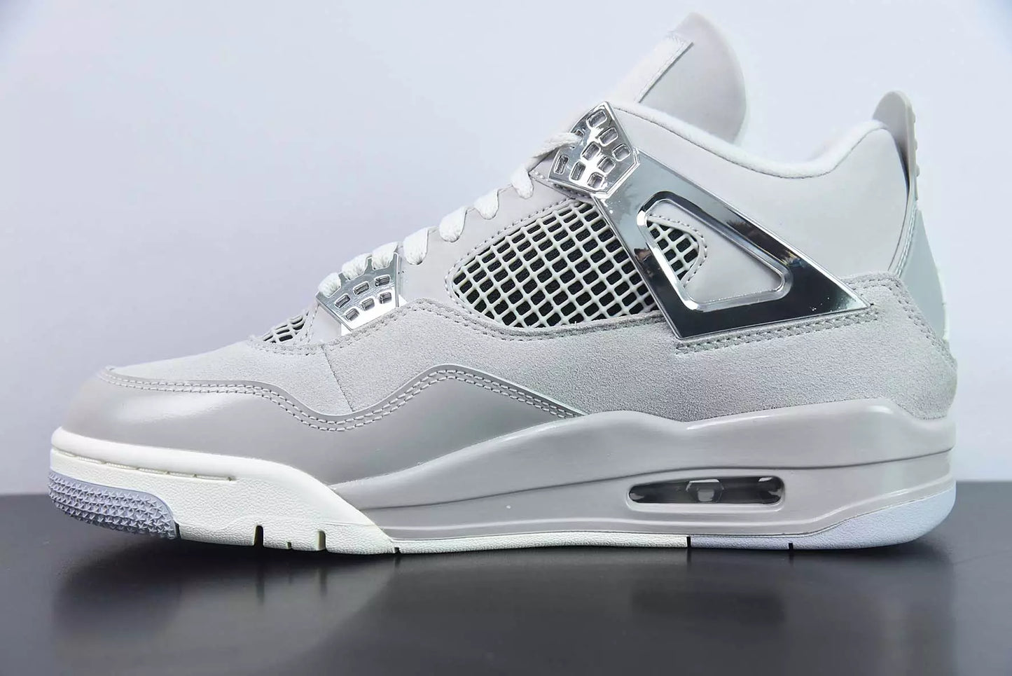 Jordan 4 Retro Frozen Moments