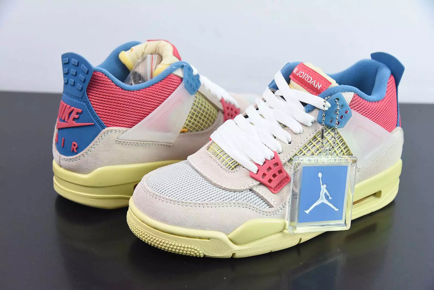 Jordan 4 Retro Union Guava Ice