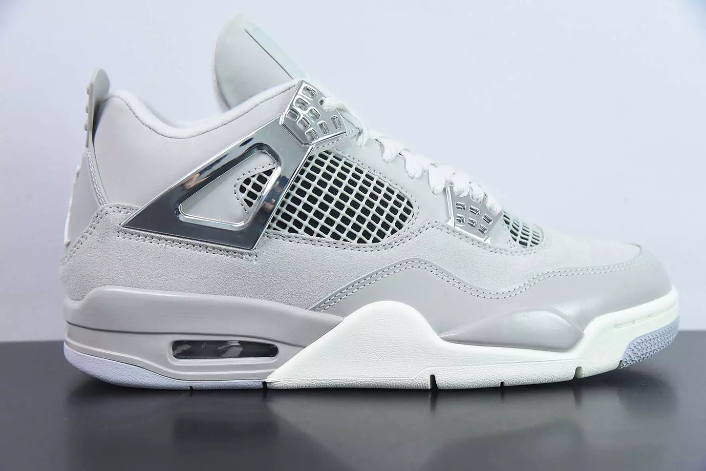 Jordan 4 Retro Frozen Moments