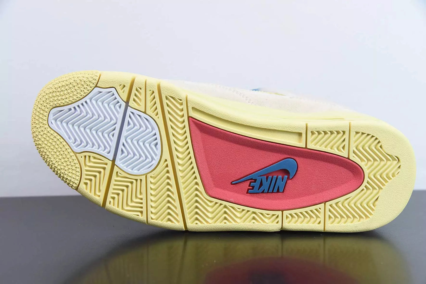 Jordan 4 Retro Union Guava Ice