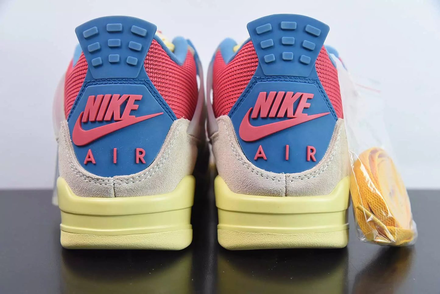 Jordan 4 Retro Union Guava Ice
