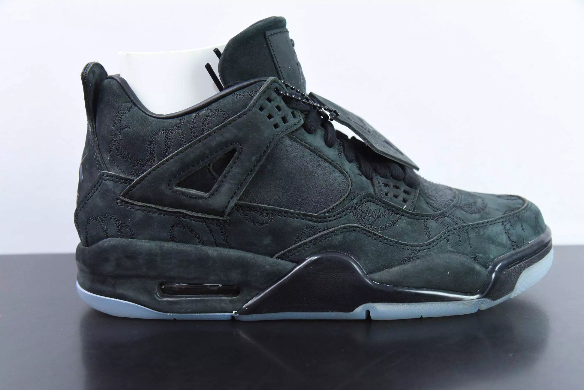 Jordan 4 Retro Kaws Black