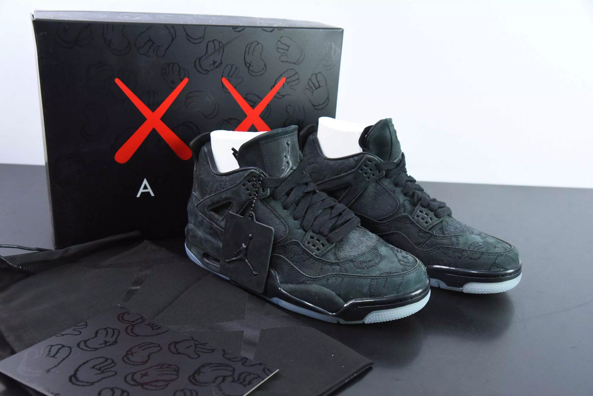 Jordan 4 Retro Kaws Black