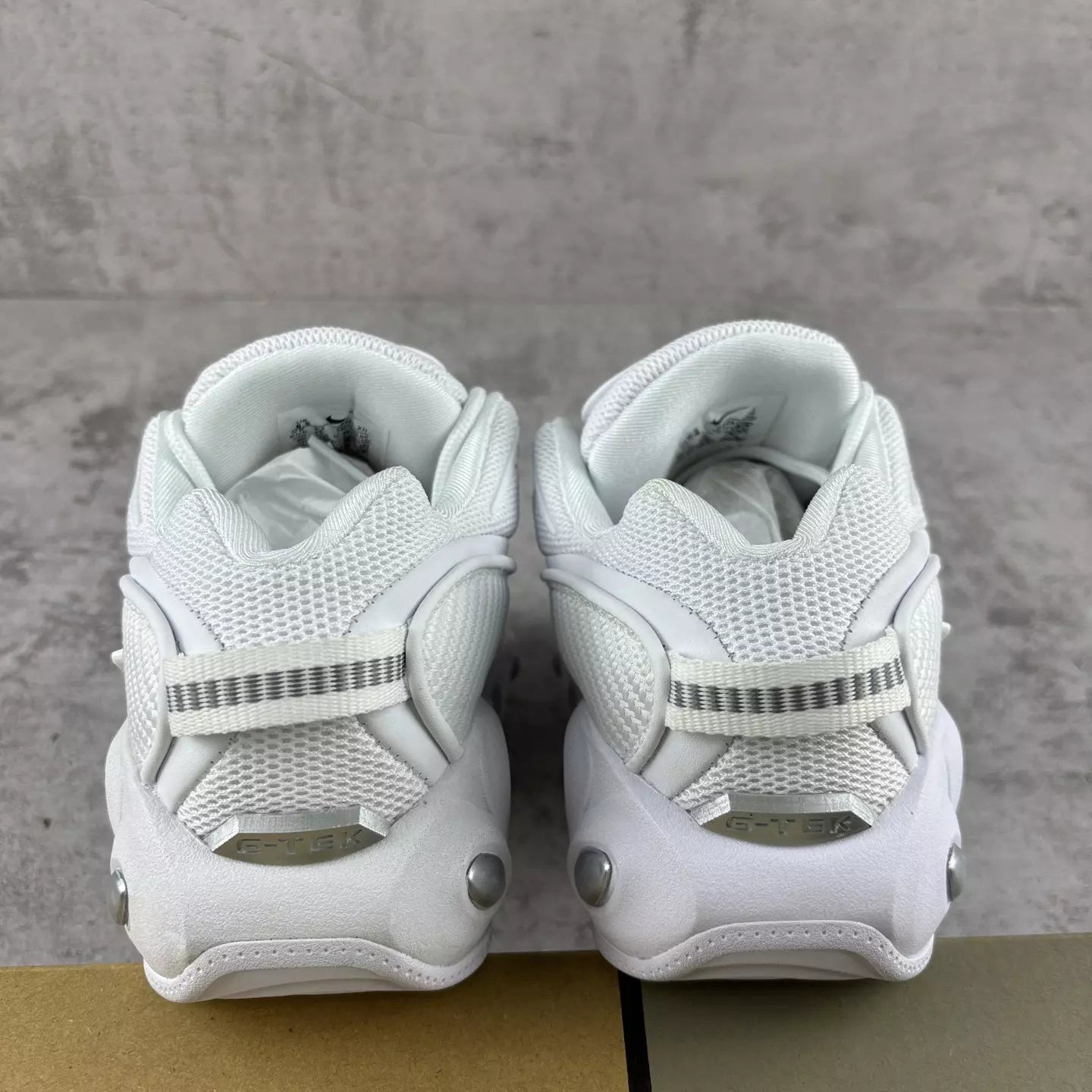 NOCTA x Nike Glide "Triple White"
