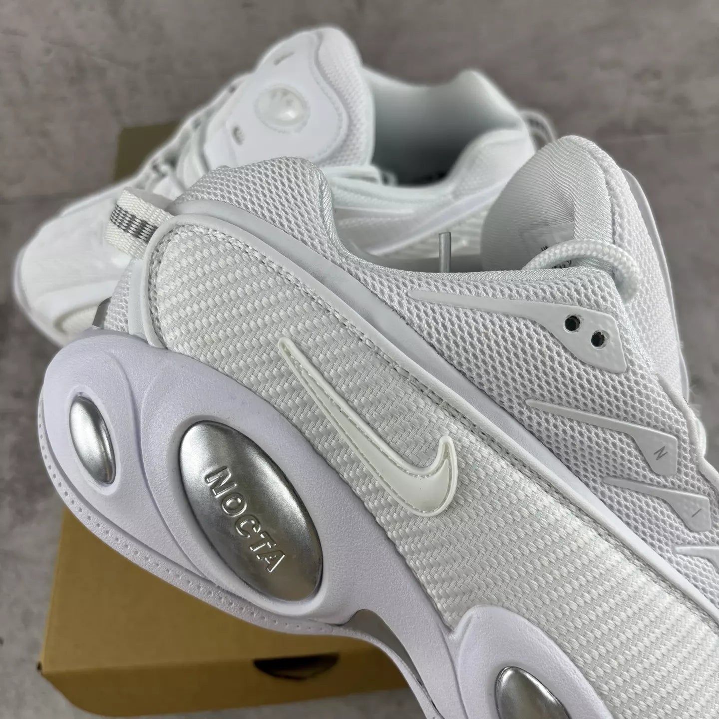 NOCTA x Nike Glide "Triple White"