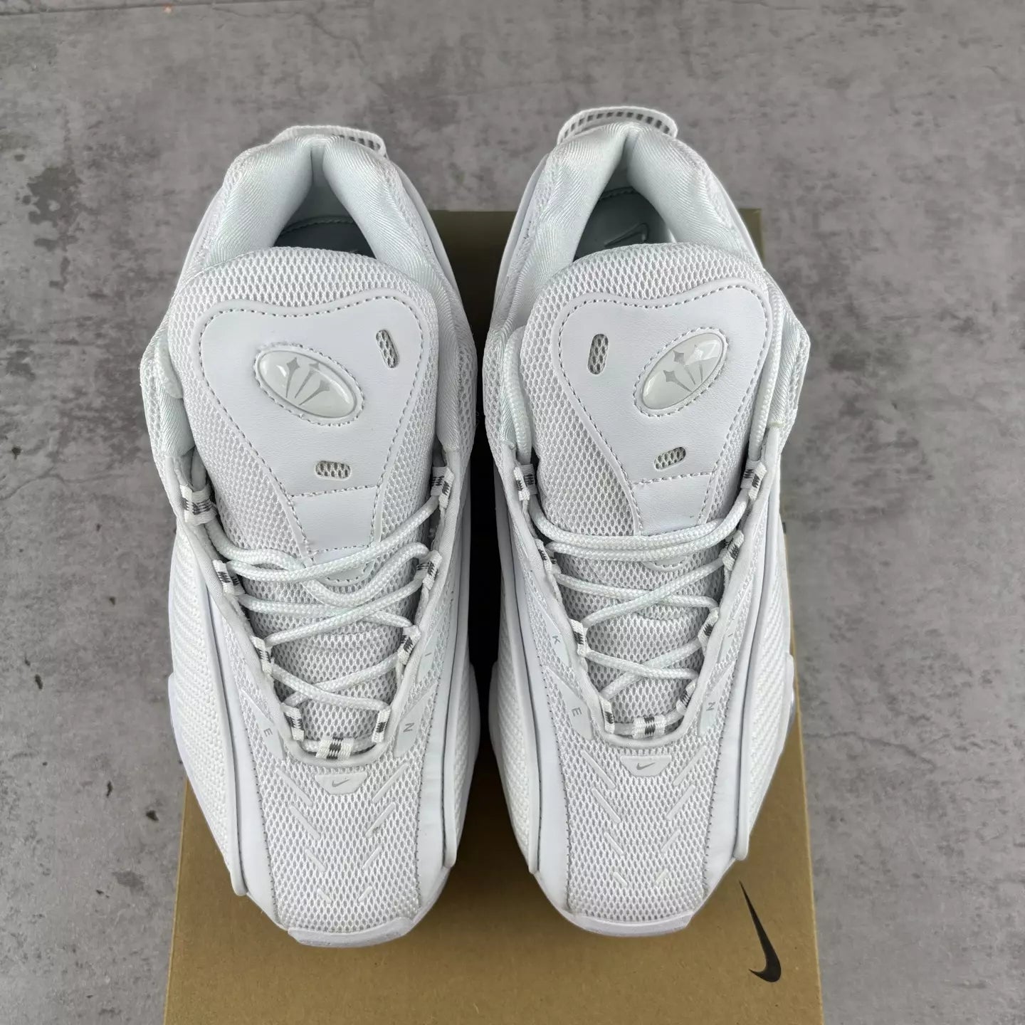 NOCTA x Nike Glide "Triple White"