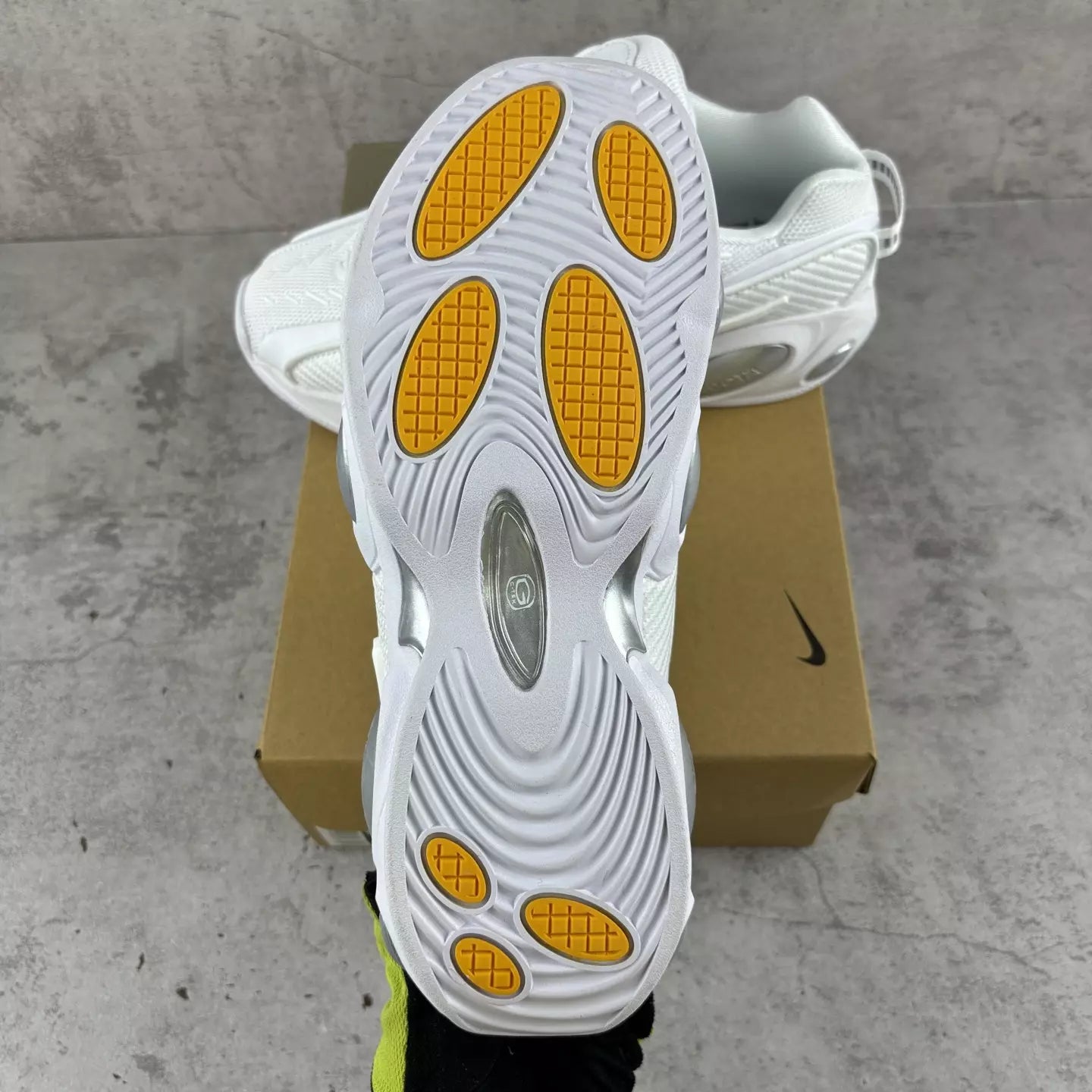 NOCTA x Nike Glide "Triple White"