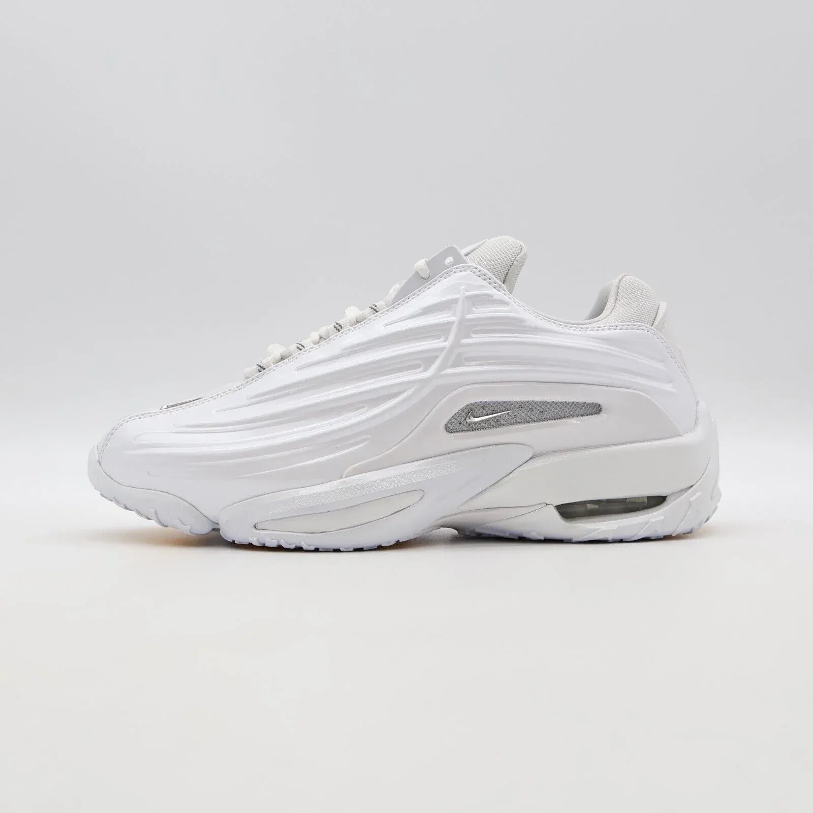 Nike x Nocta Hot Step 2 Total White Parte Lateral Esquerda