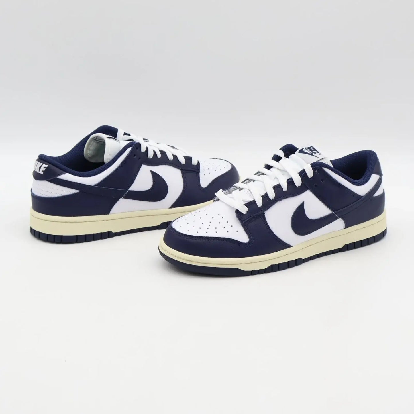 Tenis Azul Marinho Dunk Low Vintage Navy Par Visto De Lado