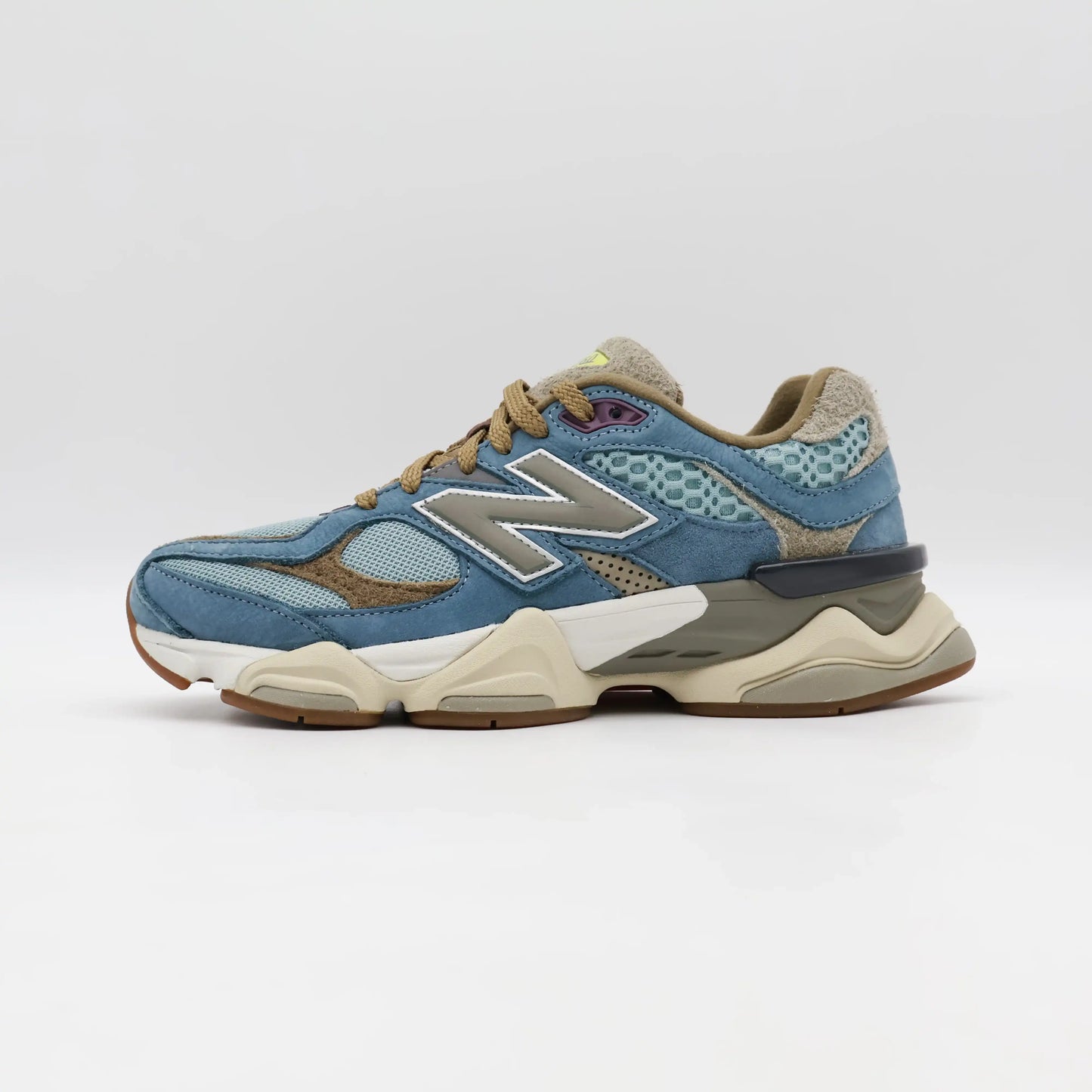 Tênis Azul Masculino New Balance 9060 Bodega Age of Discovery Parte Lateral Esquerda
