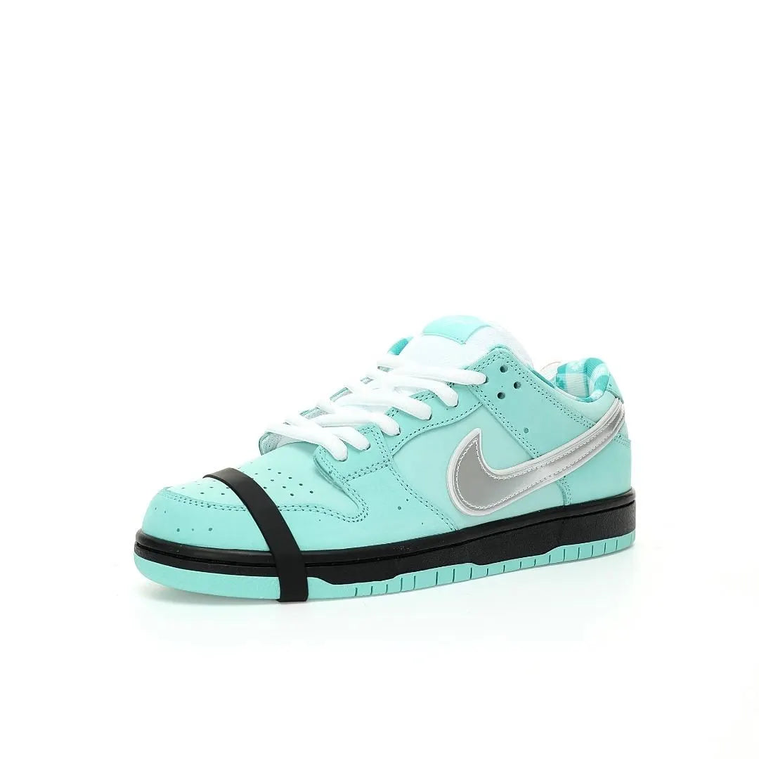 Tênis Nike Azul Concepts x Nike Dunk SB Low Tiffany Lobster Parte Lateral de Frente