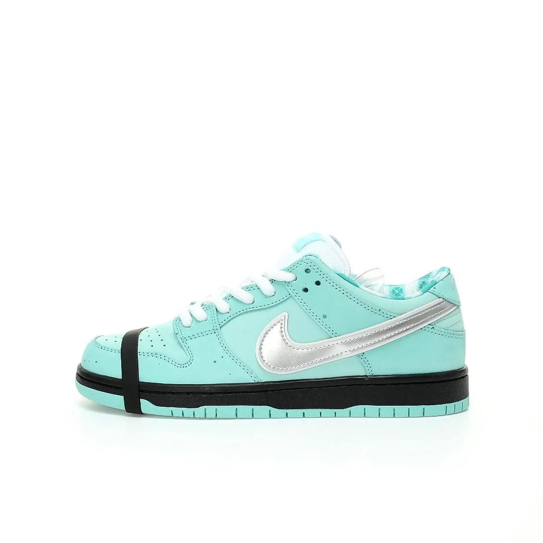 Tênis Nike Azul Concepts x Nike Dunk SB Low Tiffany Lobster Parte Lateral Esquerda
