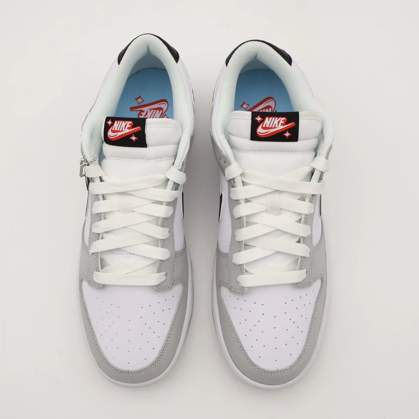 Tenis Cinza Nike Dunk Low Por Cima